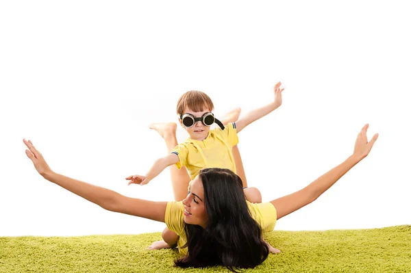 Beautiful mother and son flying — Stock Photo, Image