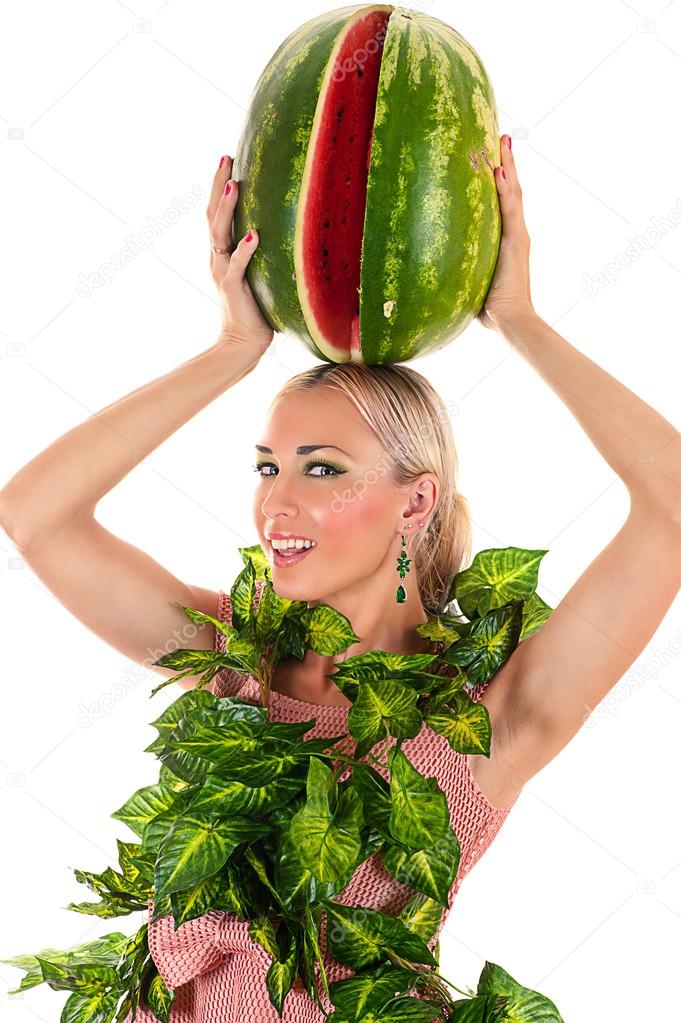 Woman with watermelon on head — Stock Photo © Dualshock 58187375
