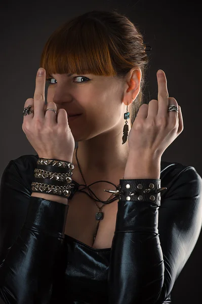 Woman showing middle fingers — Stock Photo, Image