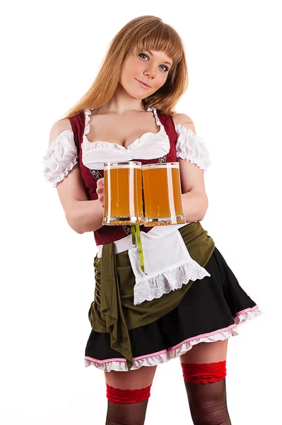 Sexy servírka Oktoberfest s pivem v ruce — Stock fotografie