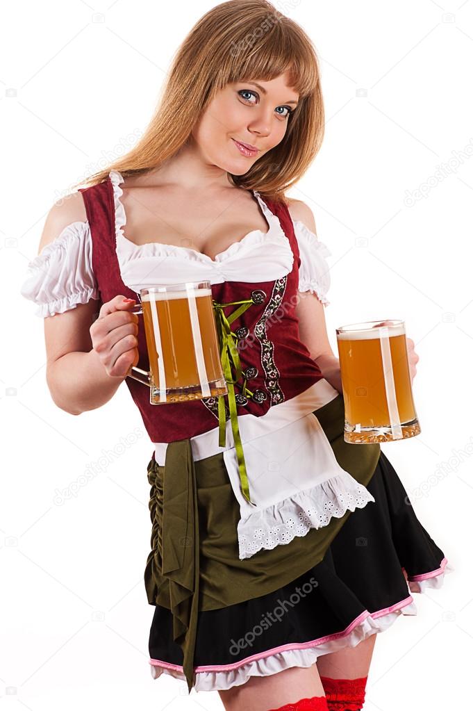 Young blond woman with Oktoberfest beer in hand