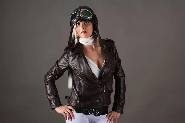 Seductive woman in aviator helmet — Stockfoto