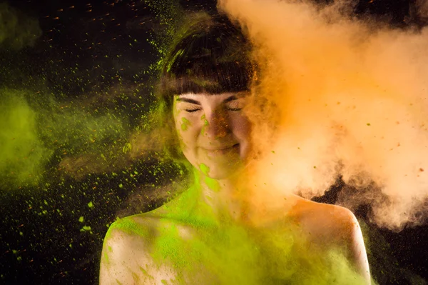 Beautiful girl in colorful paints Holi — Stock Photo, Image