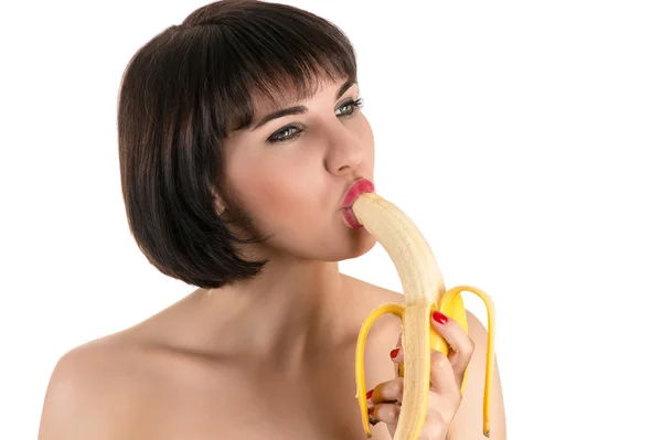 Schöne sexy Frau isst Banane — Stockfoto