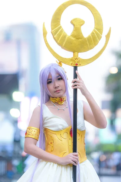 Cosplayer as characters Athena from Saint Seiya.