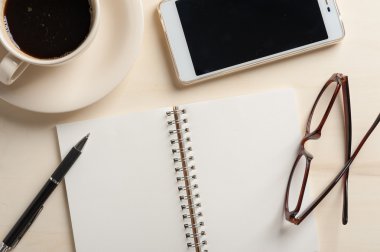 Küçük defter ve kahve fincanı