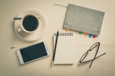 Küçük defter ve kahve fincanı