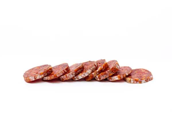 Sliced Salami on a white background — Stock Photo, Image