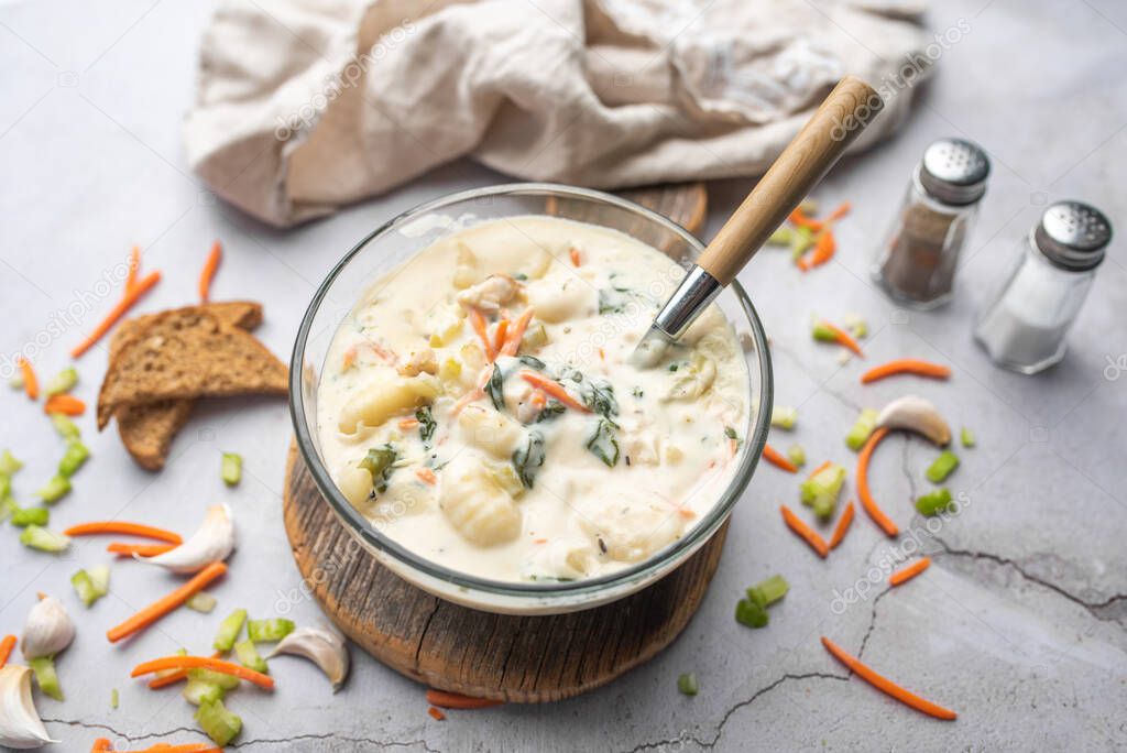 Chicken and gnocchi soup, chicken and spinach cream soup , Italian traditional