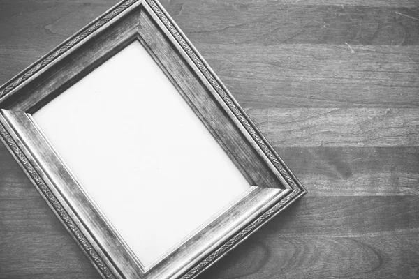 Wood frame on a wood background — Stock Photo, Image