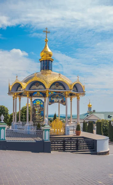 Summer altar of Pochaev Lavra with biblical stained-glass windows