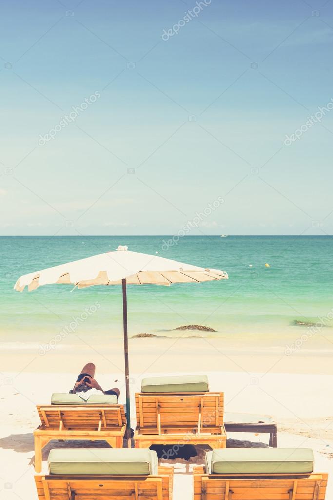 Beach Chair And Umbrella On Sand Beach Vintage Filter