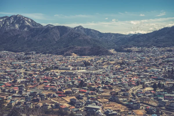 Fujikawa město pohled z červeného pagoda v Japonsku — Stock fotografie