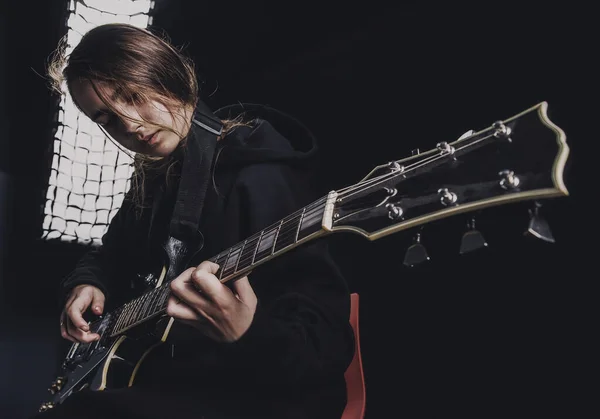 Girl Black Sweatshirt Plays Electric Guitar Dark Background — Stock Photo, Image