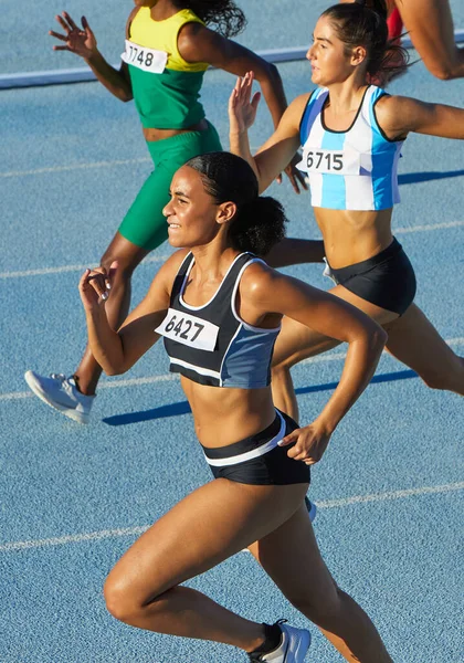 Female Track Field Athletes Running Sunny Track — Stock Photo, Image