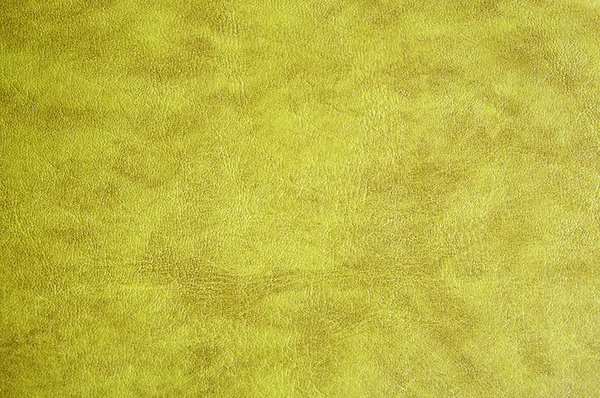 黄色の革のテクスチャの背景のクローズアップ — ストック写真