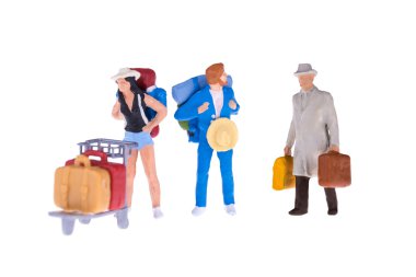 Minyatür işadamı ve turist yakın beyaz arka plan üzerinde izole
