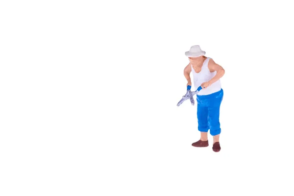 Close up of Miniature gardener people isolate on white background. — Stock Photo, Image