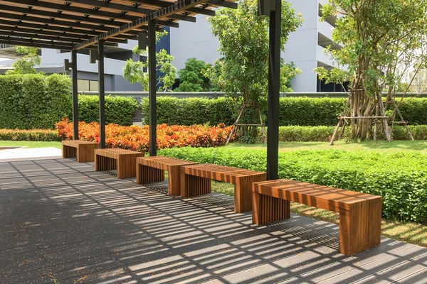 Outdoor nature wooden bench in zen garden style — Stock Photo, Image