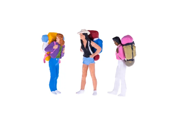 Close up of Miniature backpacker and tourist people isolate on white background. — Stock Photo, Image