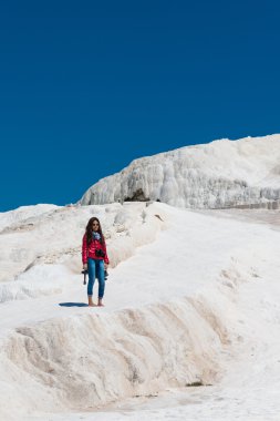 Tourists on Pamukkale travertines, Turkey.