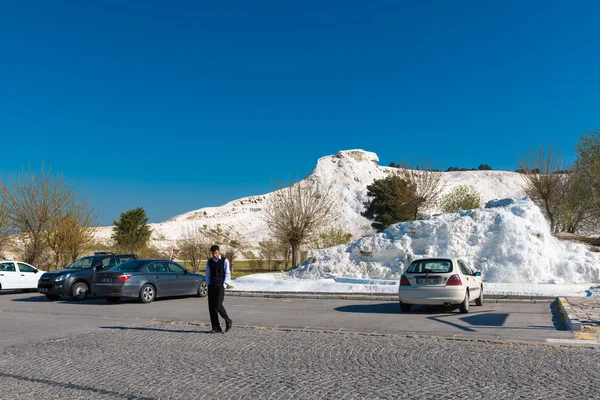 Tourists on Pamukkale travertines Turkey.