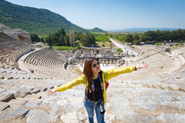 EPHESUS, TURKEY - APRIL 13 : Tourists on Amphitheater (Coliseum) in Ephesus Turkey on April 13, 2015. Ephesus contains the ancient largest collection of Roman ruins in the eastern Mediterranean.