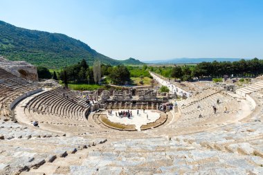 EPHESUS, TURKEY - APRIL 13 : Tourists on Amphitheater (Coliseum) in Ephesus Turkey on April 13, 2015. Ephesus contains the ancient largest collection of Roman ruins in the eastern Mediterranean.
