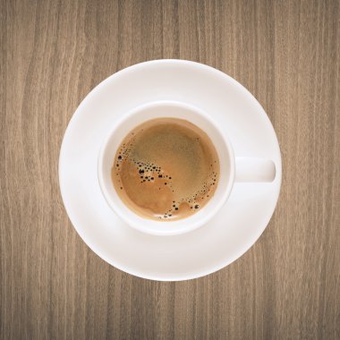 Üstten Görünüm kahve Kupası ahşap doku doğa üzerinde