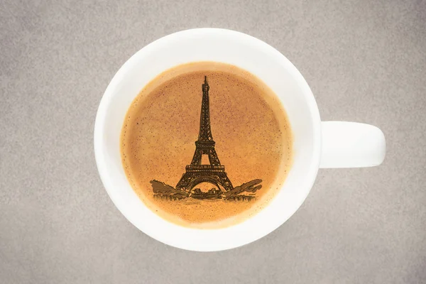 Sketch Eiffel Tower in coffee cup on fine art texture — Stockfoto