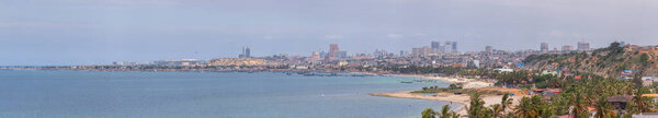 Luanda / Angola - 12 / 07 / 2020: Panoramic aerial view of downtown Luanda, marine coast and beach, marginal and central buildings, in Angola