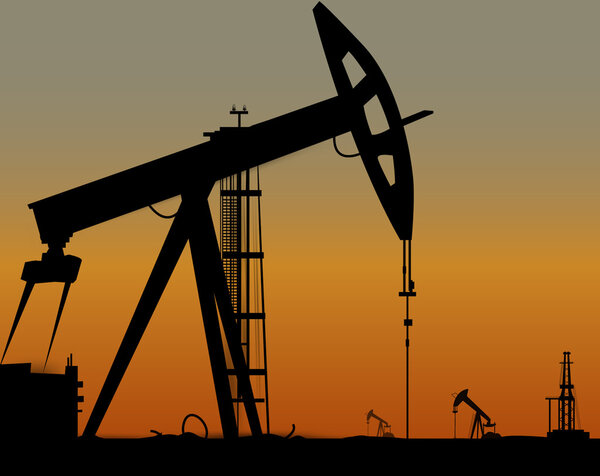 Vector image of oil derricks on the ground