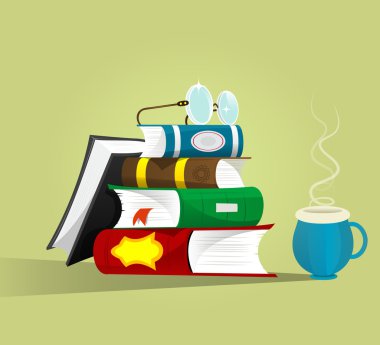 üstte gözlük ile kitap yığını