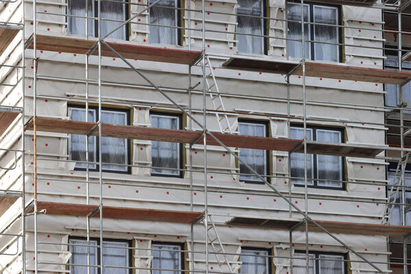 Repair and insulation of multi-storey residential buildings. 