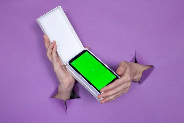 New Smartphone Green Screen Package Purple Background Girl Holds Her — Stock Photo, Image