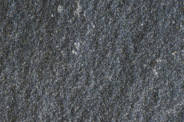 çatlak ve yongalı siyah taş dokusu, arkaplan resmi.