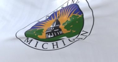Lansing şehrinin bayrağı, Michigan, Birleşik Devletler, rüzgarda sallanıyor, yavaş. Döngü