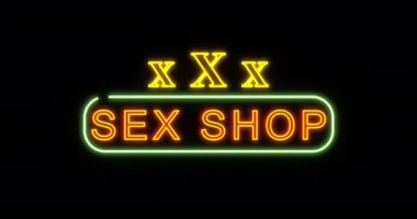 Seks Dükkanı 'nın neon ışığı gece yanıp sönüyor. Döngü