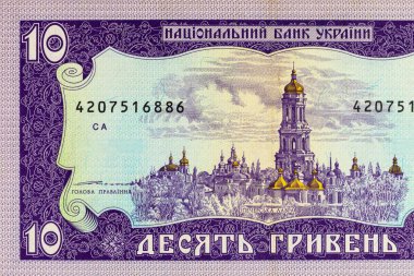 Üzerinde Kiev Pechersk Lavra resmi olan 10 hryvnia of Ukrayna banknotu. Ukrayna 'nın kağıt parası.