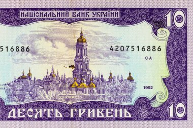 Üzerinde Kiev Pechersk Lavra resmi olan 10 hryvnia of Ukrayna banknotu. Ukrayna 'nın kağıt parası.