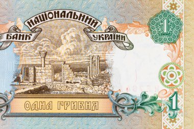 Ukrayna 1 Hryvnia banknotunun bir parçası ve Chersonese harabeleri. Ukrayna 'nın kağıt parası.