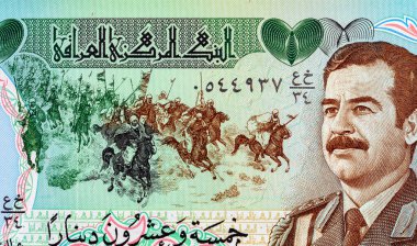 25 Dinar Irak, 1986 'da Saddam Hüseyin' in portresiyle. Irak 'ın antika parası.
