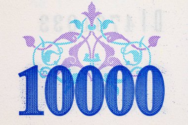 10000 Sum Özbekistan ulusal süs ve tasarım için banknotun parçalarının görüntüsüyle. Özbekistan 'ın kağıt parası