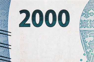Tasarım için banknotun bir parçasıyla birlikte 2000 Rupiah Endonezya. Endonezya 'nın yeni parası.