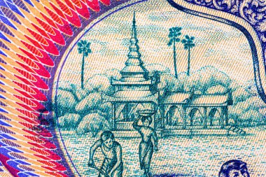 100 Kyats Myanmar, çalışan insanların ve geleneksel mimarinin görüntüleri. Myanmar 'ın Eski Kağıt Parası