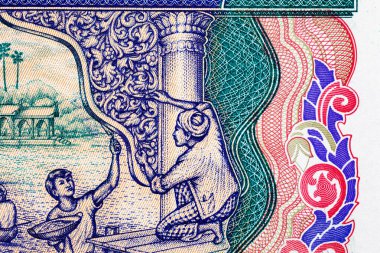 100 Kyats Myanmar, çalışan insanların ve geleneksel mimarinin görüntüleri. Myanmar 'ın Eski Kağıt Parası