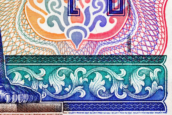 100 Kyats Myanmar, geleneksel desenlerin ve süslemelerin parçalarının görüntüsüyle. Myanmar 'ın Eski Kağıt Parası