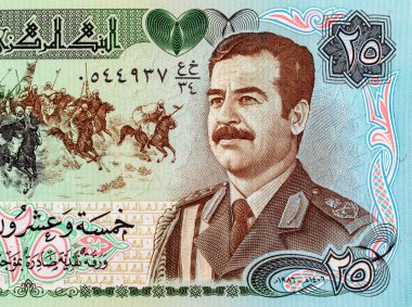 25 Dinar Irak, 1986 'da Saddam Hüseyin' in portresiyle. Irak 'ın antika parası.