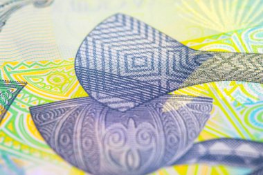 2 Kina Papua Yeni Gine tasarım için banknot parçalarının görüntüsüyle. Polimer para Papua Yeni Gine