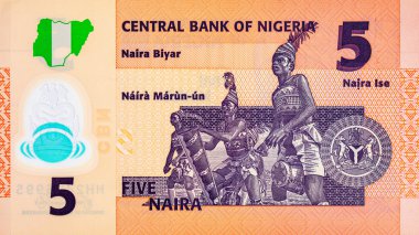 5 Naira Nijerya ve üç Yoruba davulcusunun portresi. Nijerya 'nın yeni polimer parası